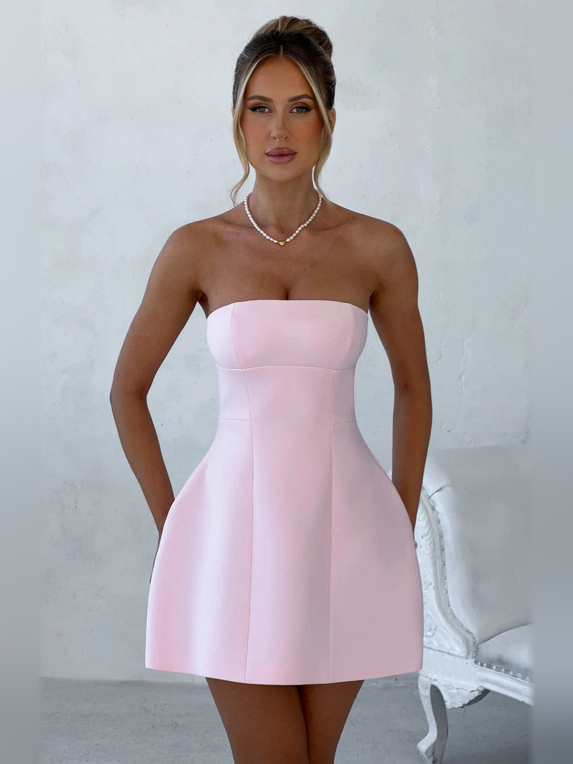Blush mini homecoming dress, front view showing the silhouette