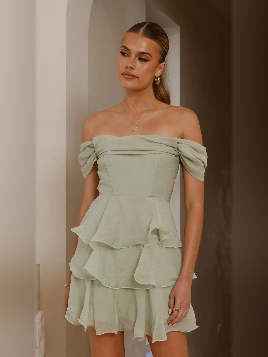Sage mini homecoming dress, front view showing the silhouette