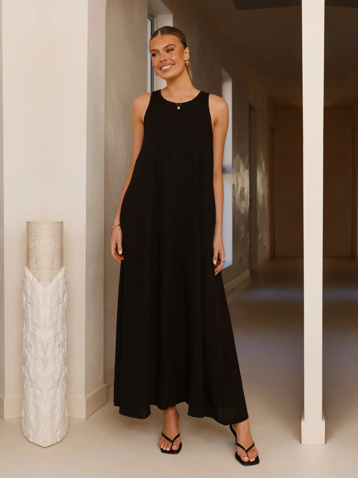 Black a-line maxi formal dress with a-line, full-length front view