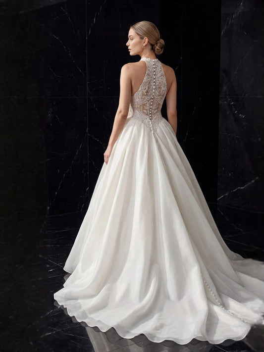 Ivory floor-length wedding dress, front view showing the a-line silhouette