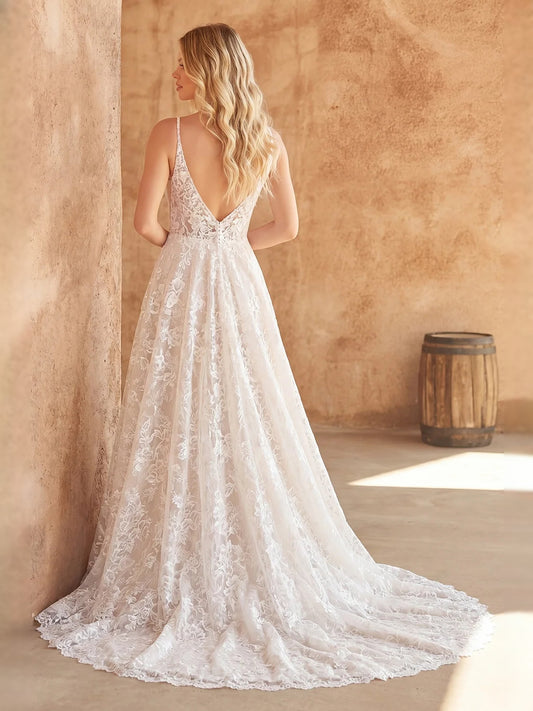 Ivory floor-length wedding dress, front view showing the a-line silhouette