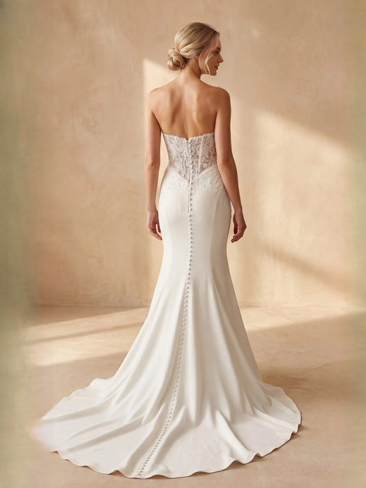 Ivory floor-length wedding dress, front view showing the mermaid silhouette