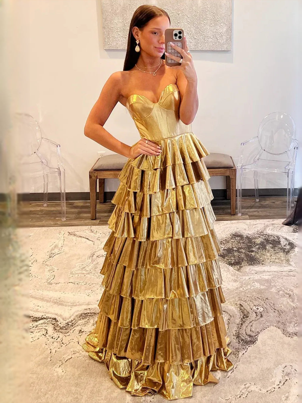 Gold maxi prom dress, front view showing the a-line silhouette