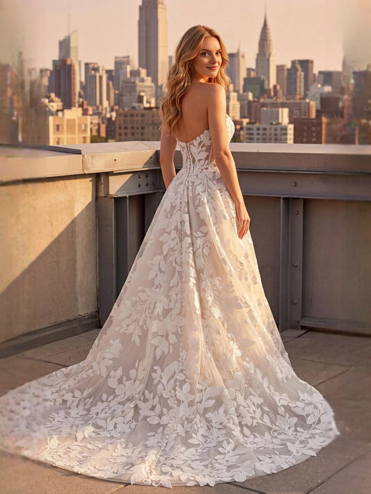 Ivory floor-length wedding dress, front view showing the a-line silhouette