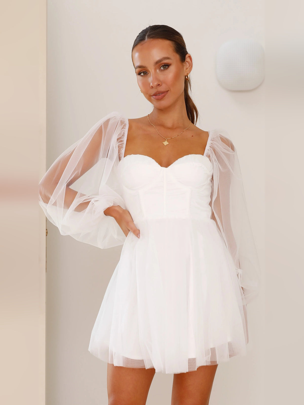 White mini homecoming dress, front view showing the silhouette