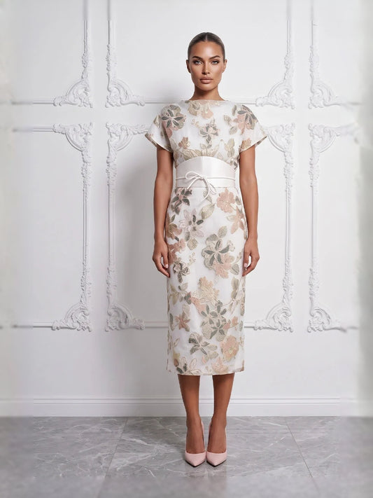 Ivory short mother of the bride dress, front view showing the sheath silhouette