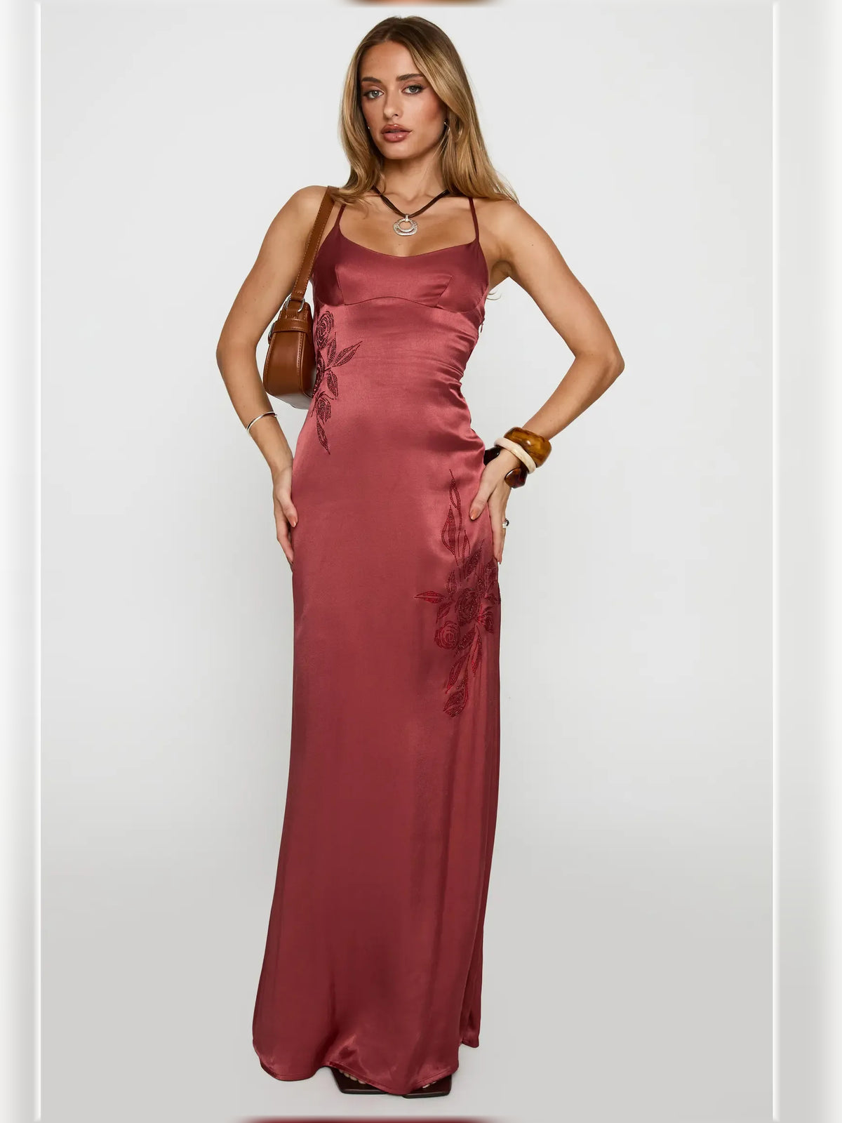 Red mermaid floor-length formal dress with floral print, full-length front view