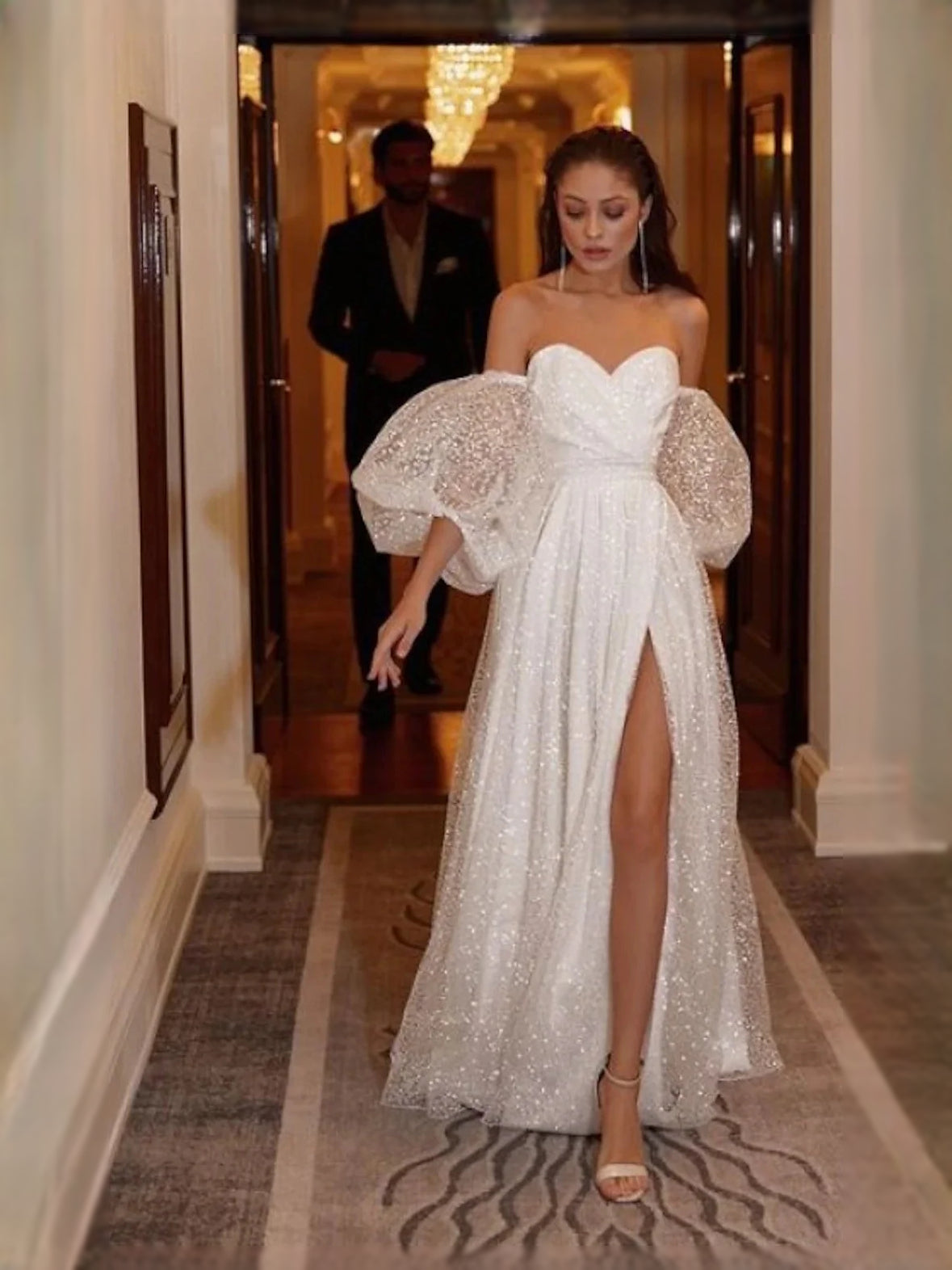 Ivory floor-length wedding dress, front view showing the a-line silhouette