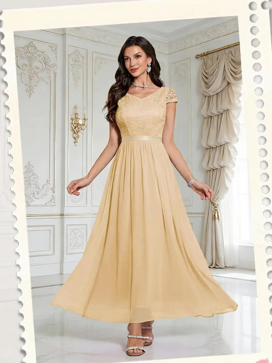Champagne floor-length prom dress, front view showing the a-line silhouette