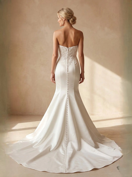 Ivory floor-length wedding dress, front view showing the mermaid silhouette