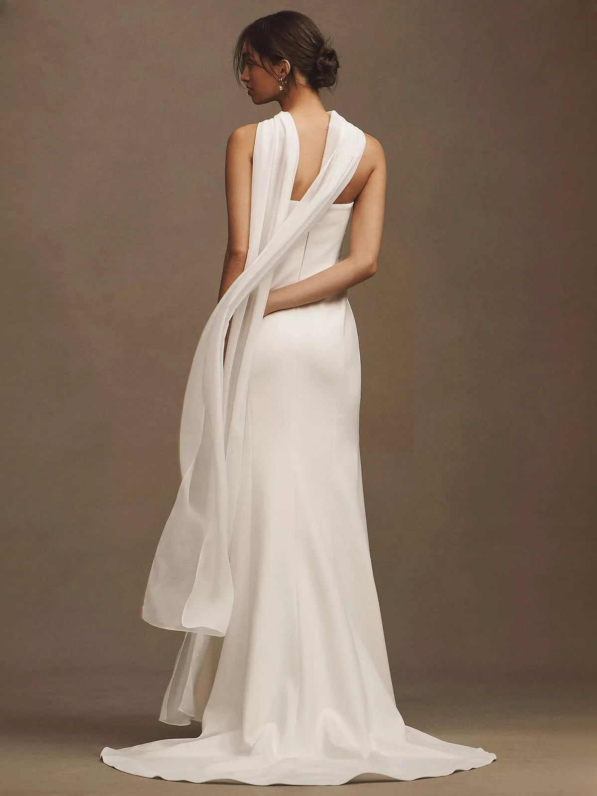 Ivory floor-length wedding dress, front view showing the mermaid silhouette