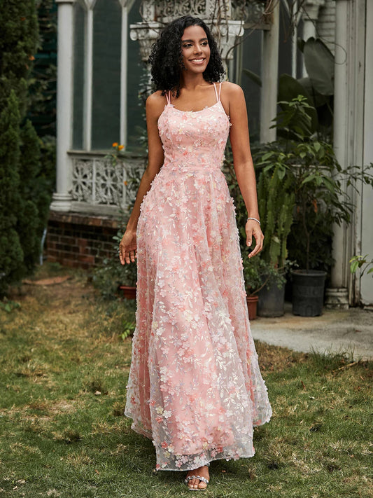 Floral floor-length prom dress, front view showing the a-line silhouette