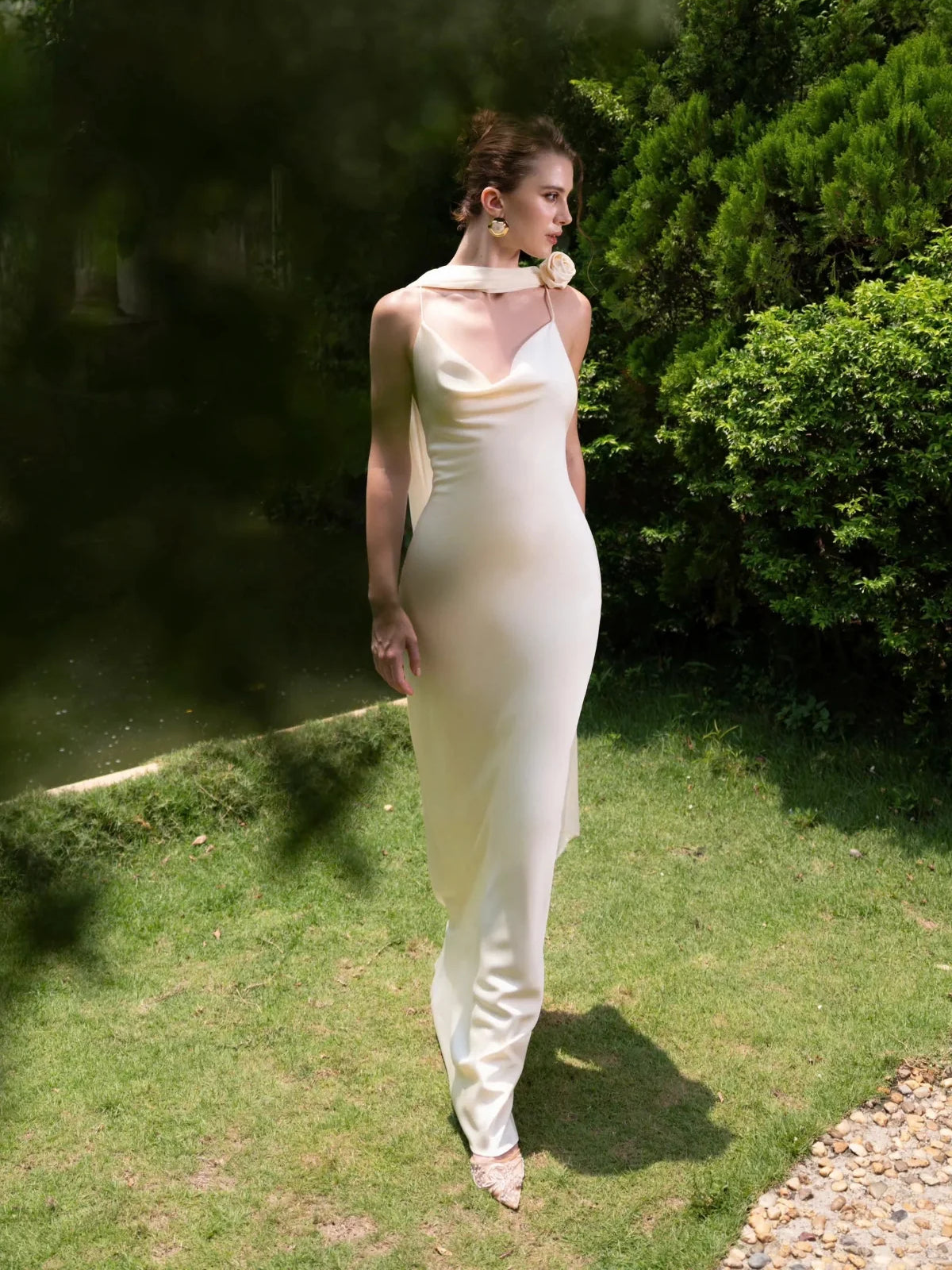 Ivory floor-length wedding dress, front view showing the sheath silhouette