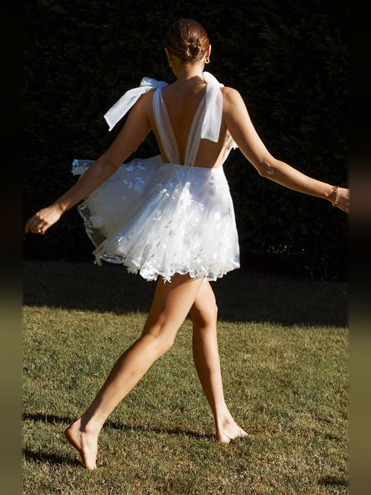 White mini homecoming dress, front view showing the silhouette