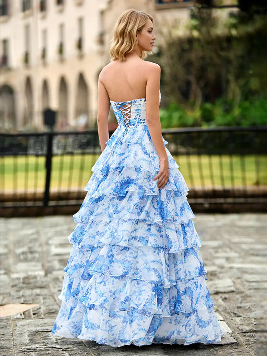 Blue floor-length prom dress, front view showing the a-line silhouette