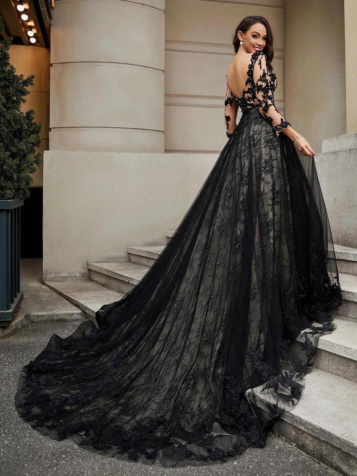 Black floor-length wedding dress, front view showing the a-line silhouette