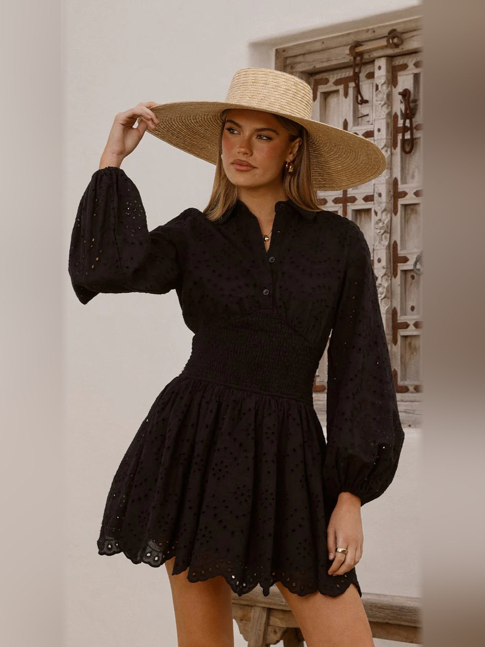 Black mini homecoming dress, front view showing the silhouette