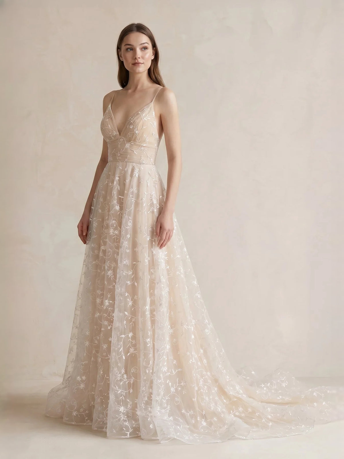Champagne floor-length bridesmaid dress, front view showing the a-line silhouette