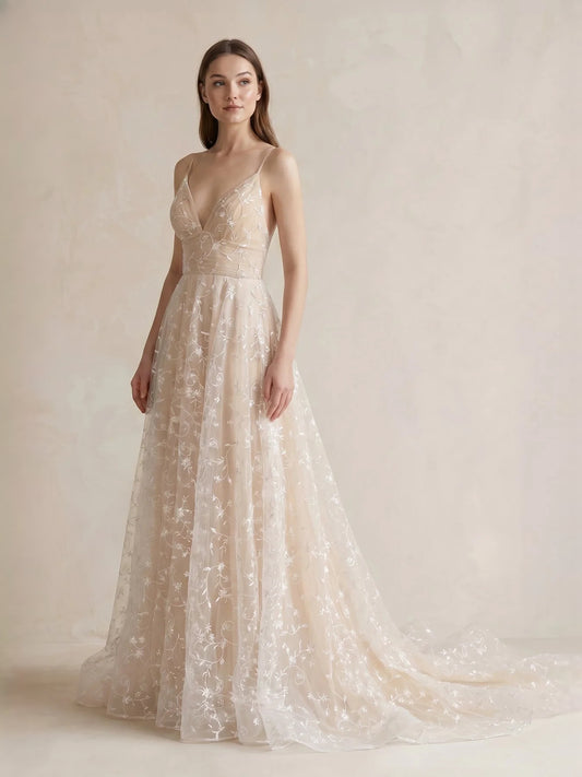 Champagne floor-length bridesmaid dress, front view showing the a-line silhouette