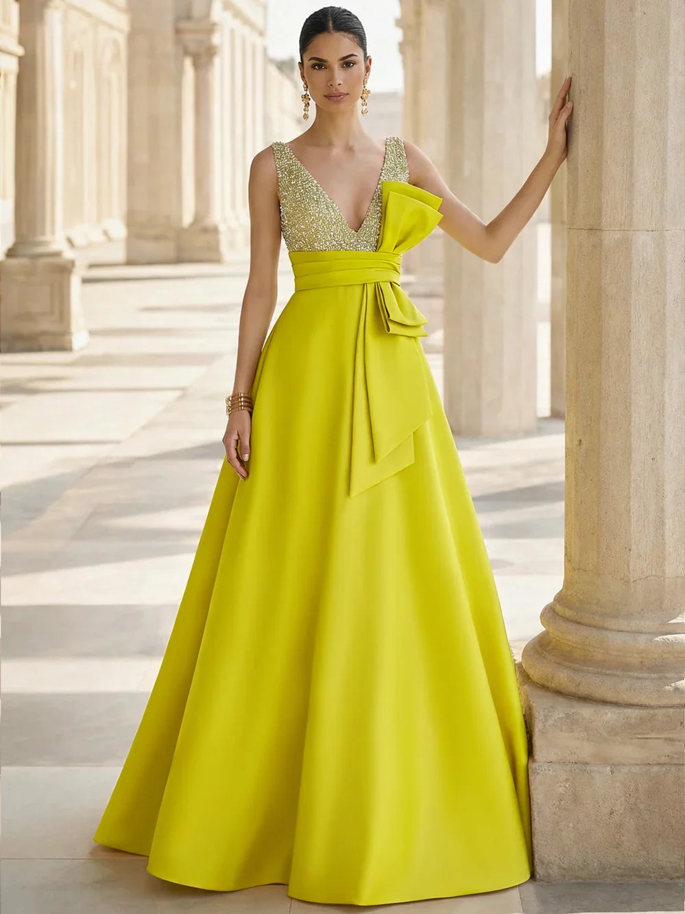 Yellow a-line floor-length formal dress with V-neckline, full-length front view