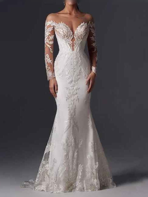 White floor-length wedding dress, front view showing the a-line silhouette