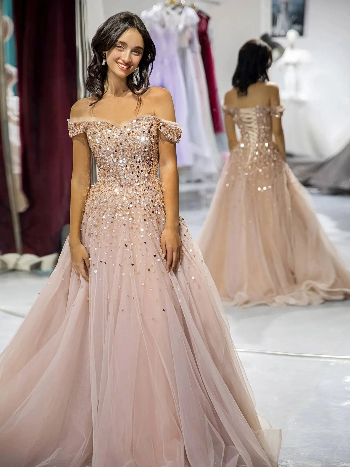 Champagne a-line floor-length formal dress with off-the-shoulder neckline, full-length front view