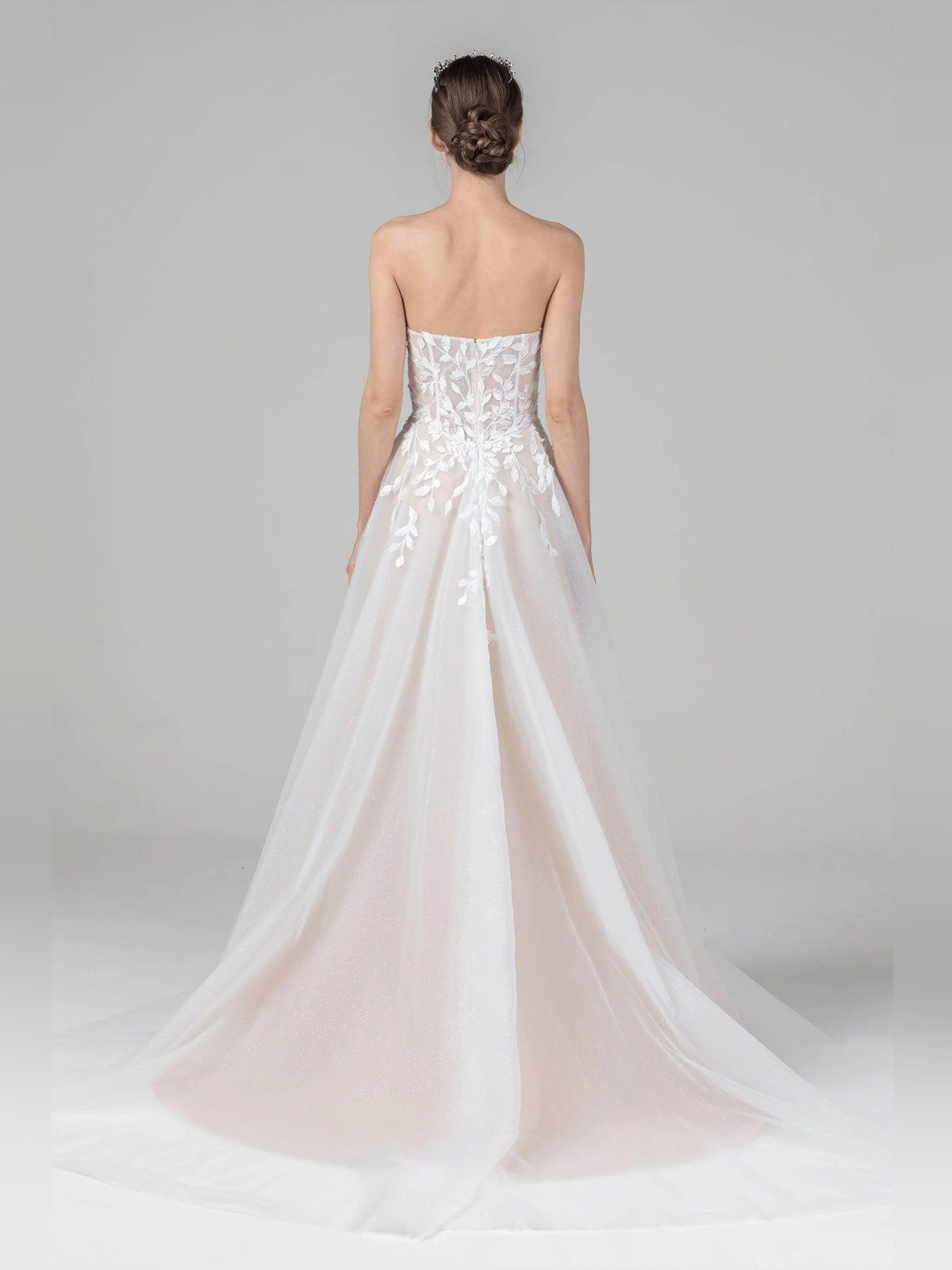 Ivory floor-length wedding dress, front view showing the a-line silhouette