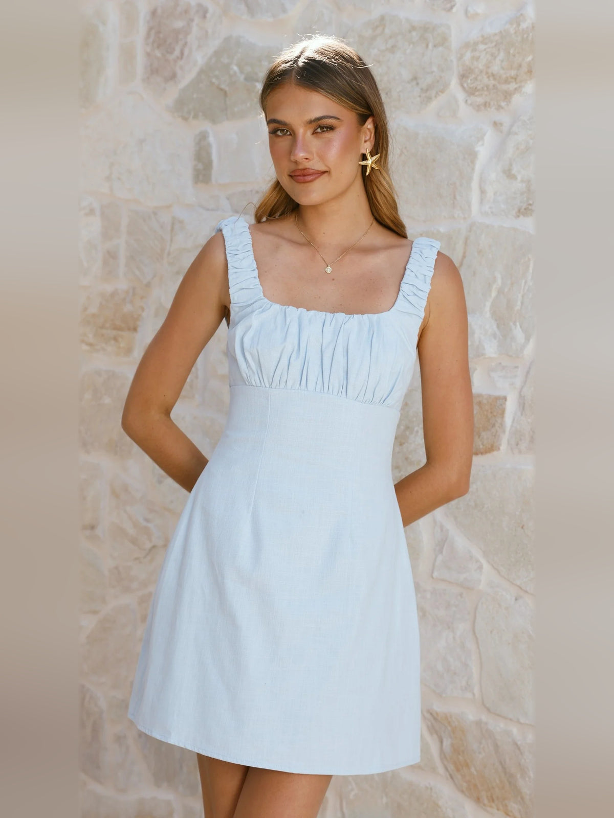 Blue mini homecoming dress, front view showing the silhouette