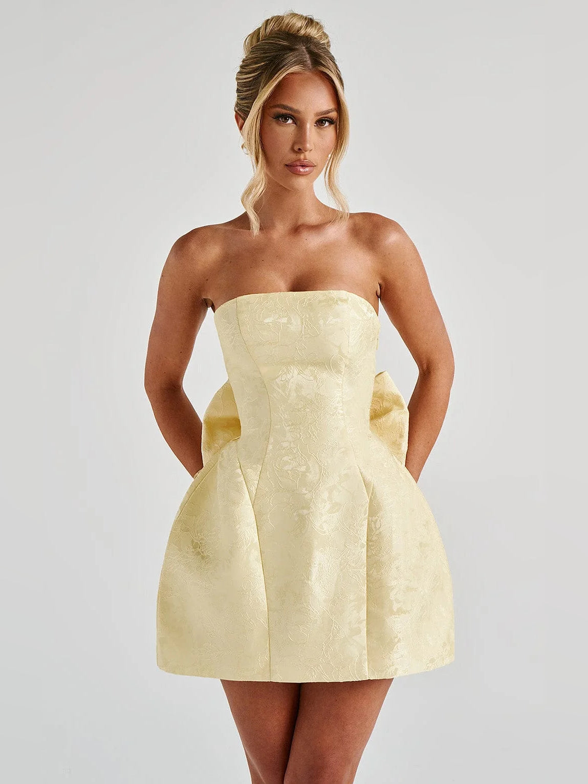Lemon mini homecoming dress, front view showing the silhouette