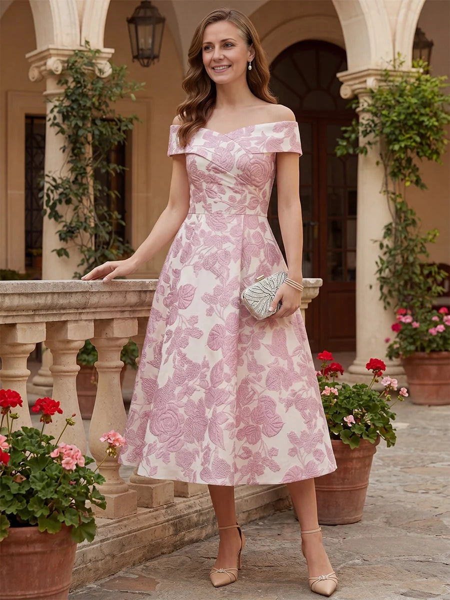 Ivory white tea-length mother of the bride dress, front view showing the a-line silhouette