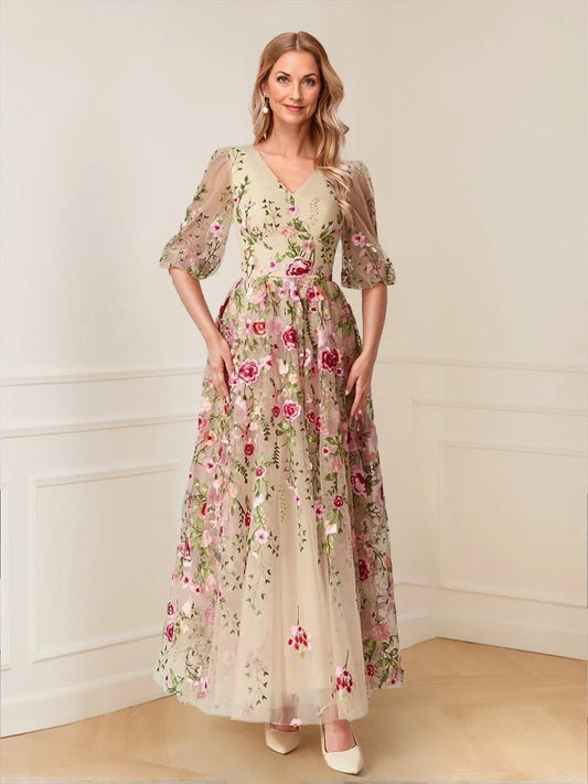 Ivory white floor-length mother of the bride dress, front view showing the a-line silhouette
