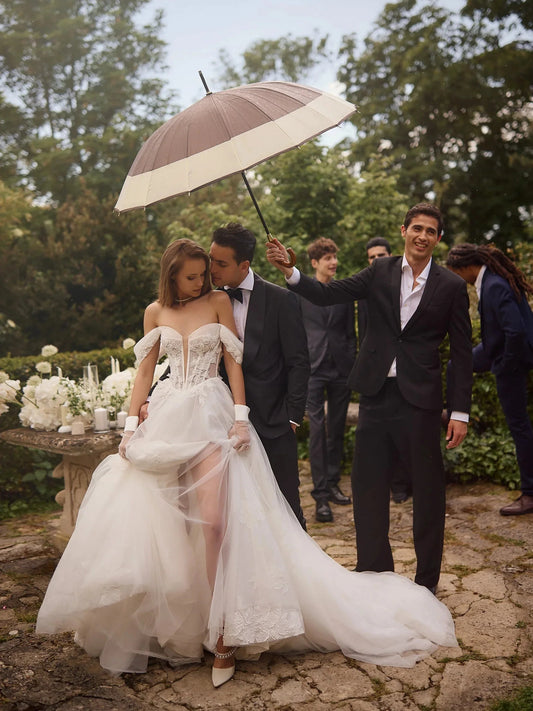 Ivory floor-length wedding dress, front view showing the a-line silhouette