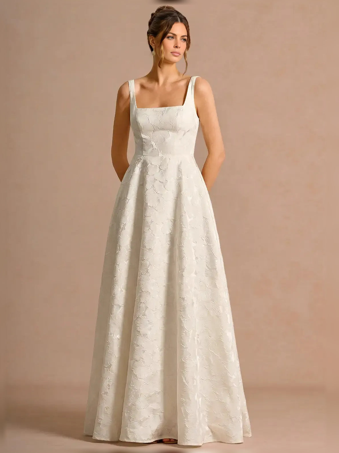 Ivory maxi mother of the bride dress, front view showing the a-line silhouette