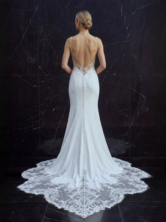 White floor-length wedding dress, front view showing the mermaid silhouette