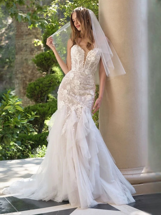 Ivory floor-length wedding dress, front view showing the mermaid silhouette
