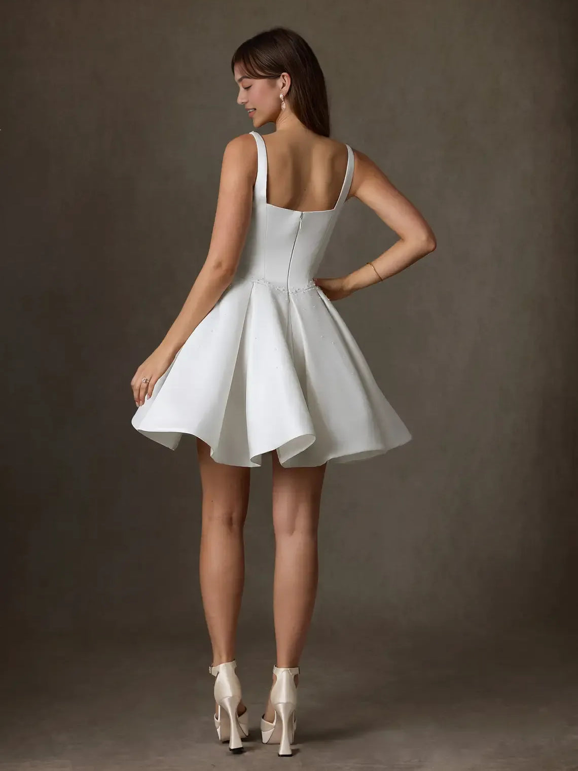 White mini wedding dress, front view showing the a-line silhouette