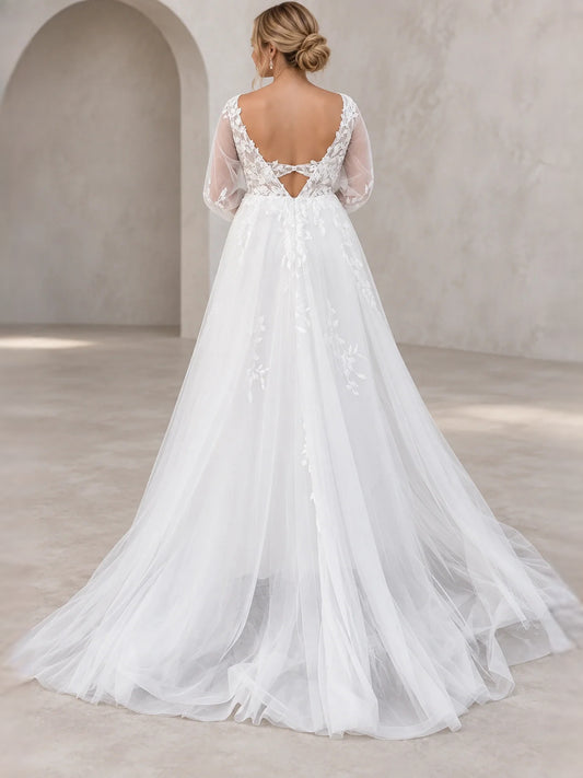 White floor-length wedding dress, front view showing the a-line silhouette