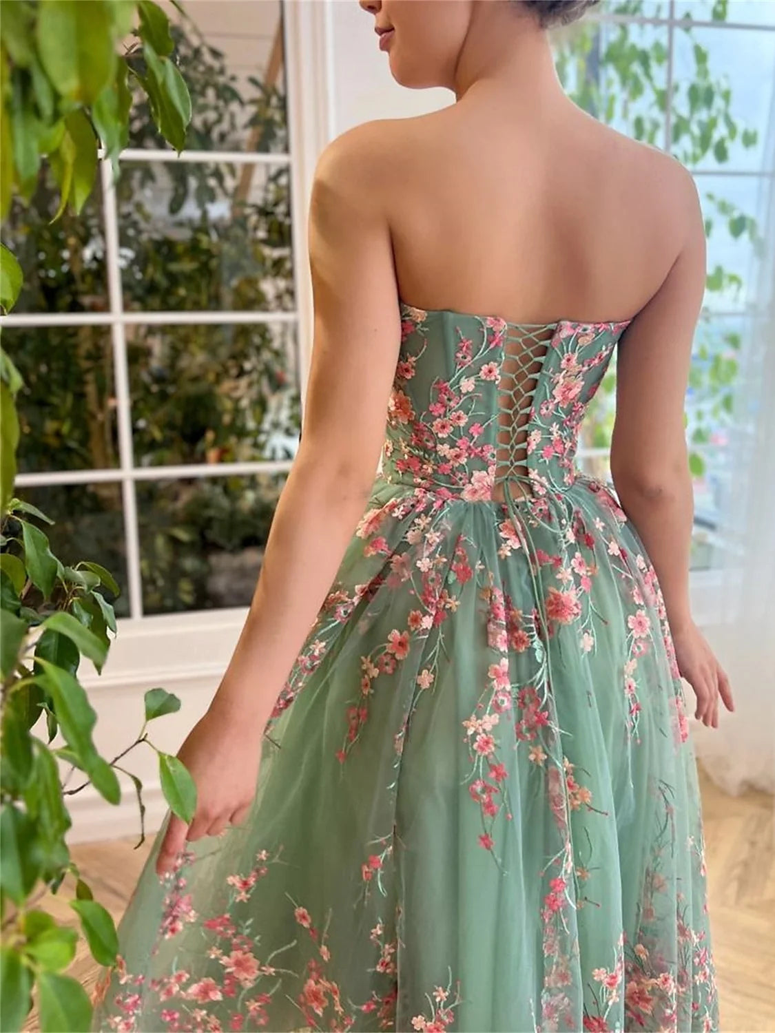 Emerald Green tea-length prom dress, front view showing the a-line silhouette