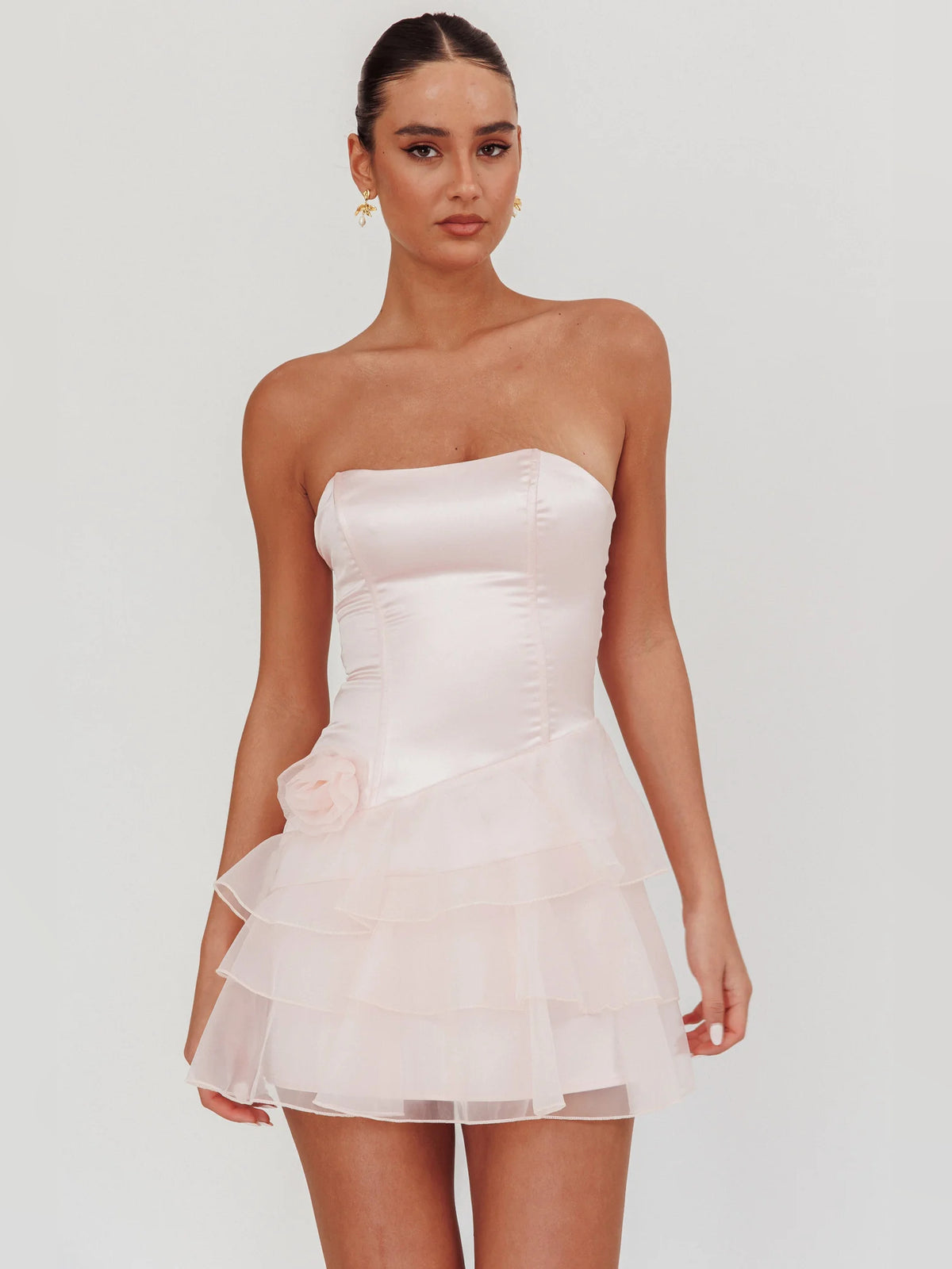 Blush mini homecoming dress, front view showing the silhouette
