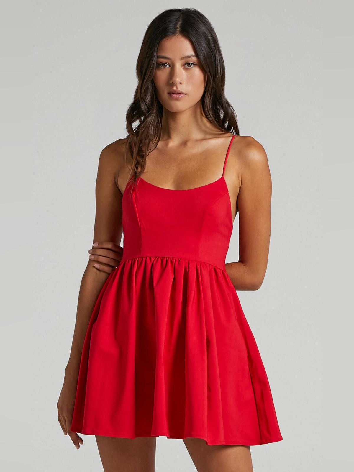 Red mini homecoming dress, front view showing the a-line silhouette