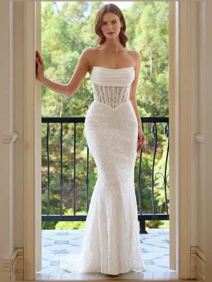 White mermaid floor-length formal dress with strapless neckline, full-length front view