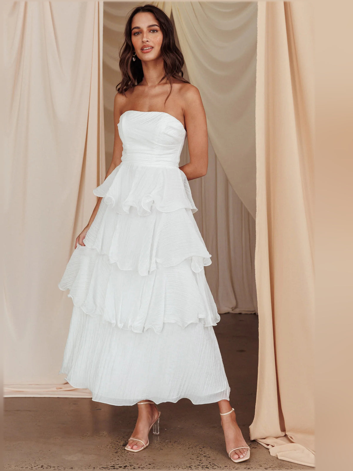 Off White midi formal dress with strapless neckline, full-length front view