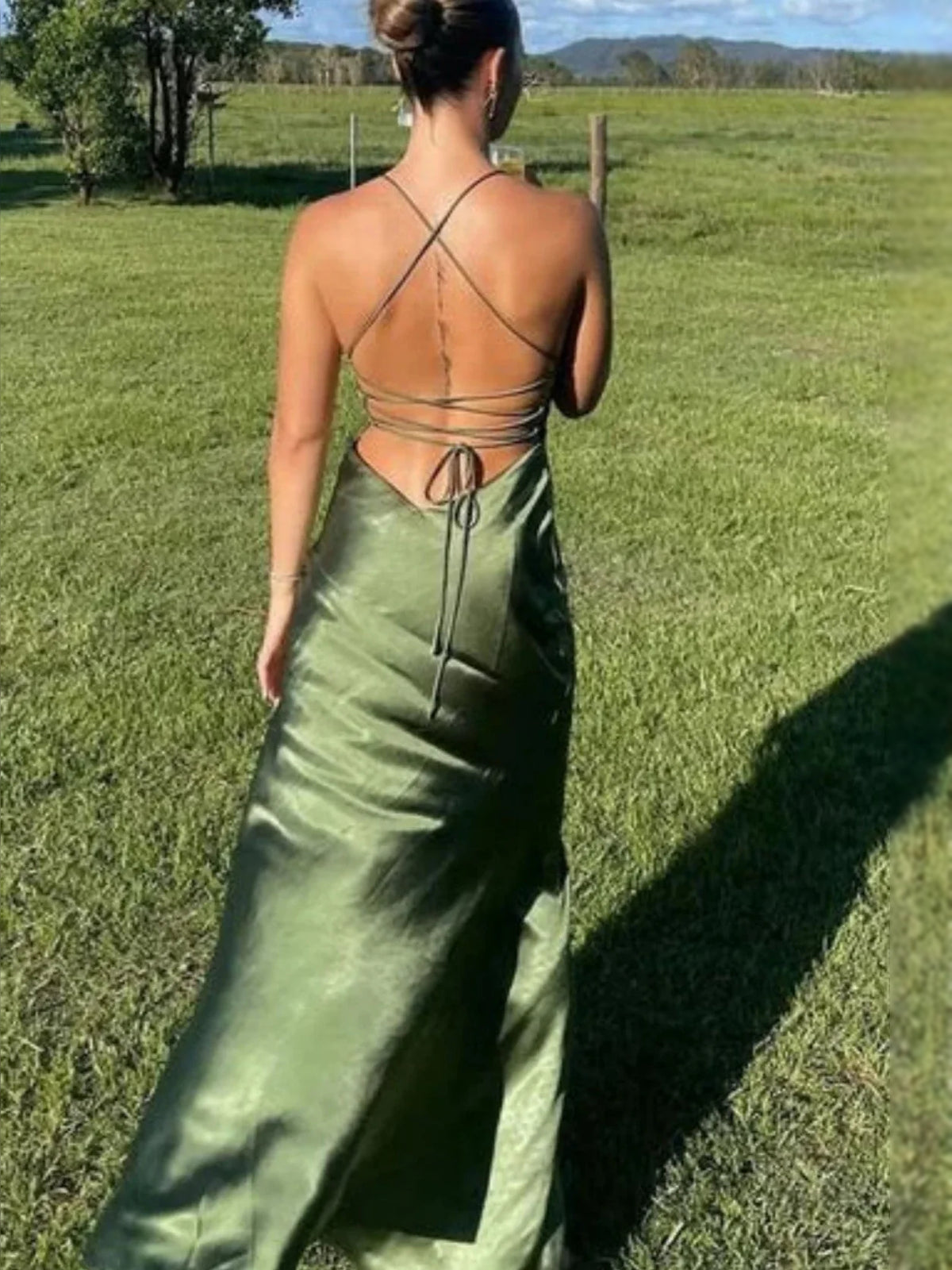 Green floor-length prom dress, front view showing the sheath silhouette