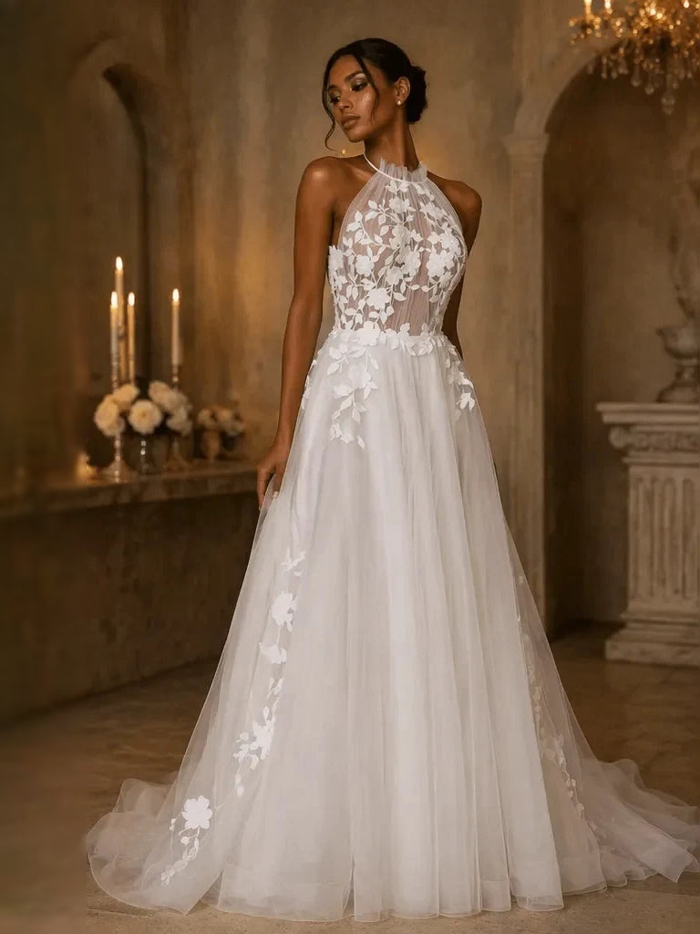Ivory floor-length wedding dress, front view showing the a-line silhouette