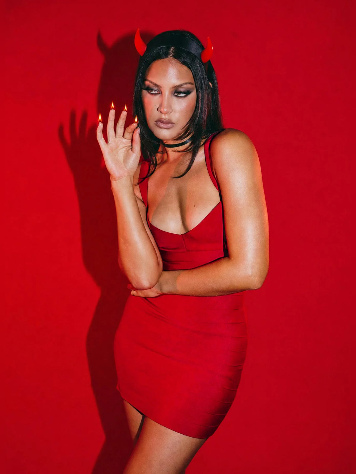 Red mini homecoming dress, front view showing the bodycon silhouette