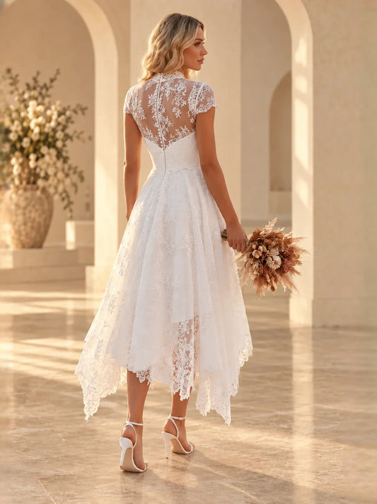 White tea-length wedding dress, front view showing the a-line silhouette