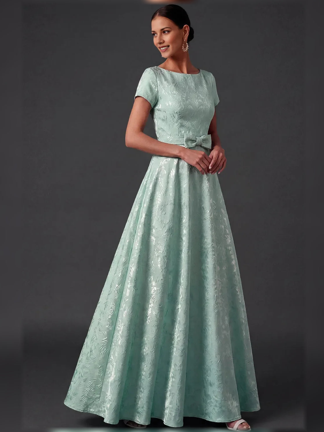 Mint Green short mother of the bride dress, front view showing the a-line silhouette