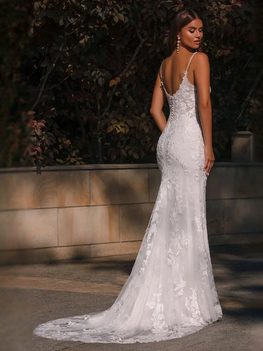 White floor-length wedding dress, front view showing the mermaid silhouette
