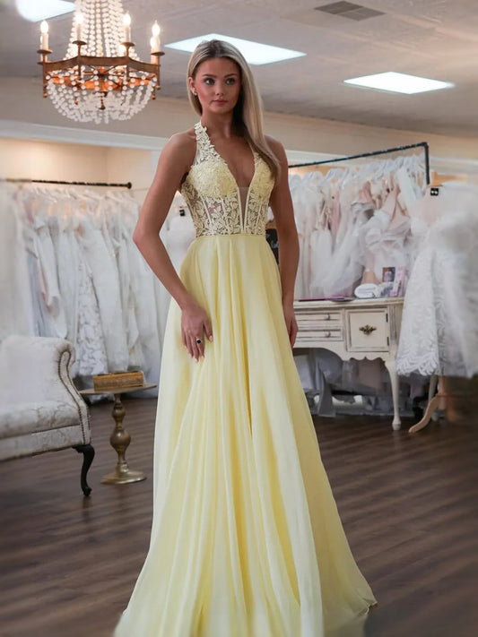 Yellow floor-length prom dress, front view showing the a-line silhouette
