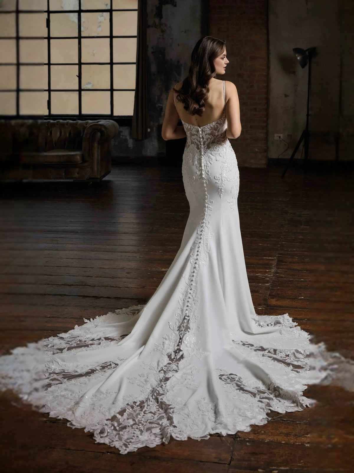 Ivory floor-length wedding dress, front view showing the mermaid silhouette